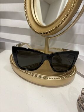 Prada Black Cat-Eye Sunglasses with Dark Lenses